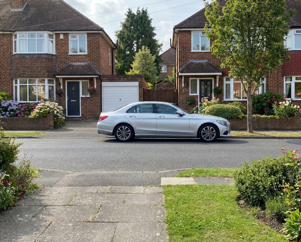 Residential street in Felpham with wheelie bins
